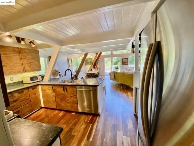 Rare location! Beautiful mid-century modern A-Frame home tucked on Pine Mountain Lake Country Club in California - for sale on GolfHomes.com, golf home, golf lot