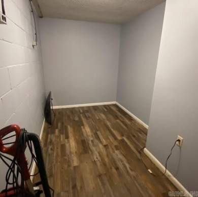 Charming and low-maintenance townhouse located in the heart of on DeSoto Golf Course in Arkansas - for sale on GolfHomes.com, golf home, golf lot