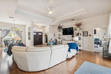 Experience timeless design, modern upgrades, and effortless on Oak Hills Country Club in Florida - for sale on GolfHomes.com, golf home, golf lot