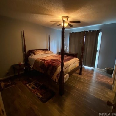 Charming and low-maintenance townhouse located in the heart of on DeSoto Golf Course in Arkansas - for sale on GolfHomes.com, golf home, golf lot