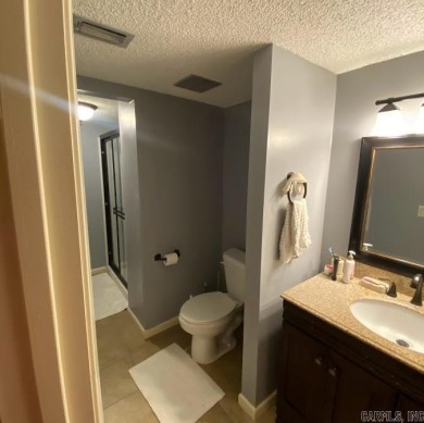 Charming and low-maintenance townhouse located in the heart of on DeSoto Golf Course in Arkansas - for sale on GolfHomes.com, golf home, golf lot