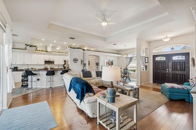 Experience timeless design, modern upgrades, and effortless on Oak Hills Country Club in Florida - for sale on GolfHomes.com, golf home, golf lot