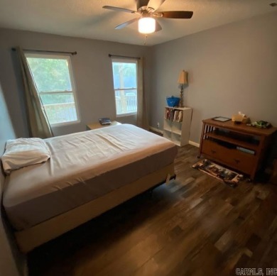 Charming and low-maintenance townhouse located in the heart of on DeSoto Golf Course in Arkansas - for sale on GolfHomes.com, golf home, golf lot