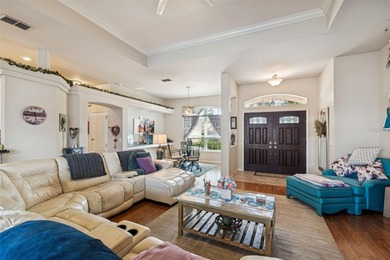 Experience timeless design, modern upgrades, and effortless on Oak Hills Country Club in Florida - for sale on GolfHomes.com, golf home, golf lot