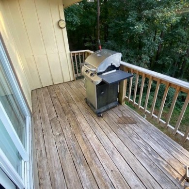 Charming and low-maintenance townhouse located in the heart of on DeSoto Golf Course in Arkansas - for sale on GolfHomes.com, golf home, golf lot