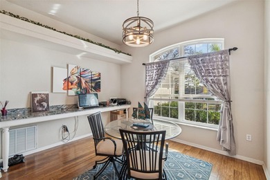 Experience timeless design, modern upgrades, and effortless on Oak Hills Country Club in Florida - for sale on GolfHomes.com, golf home, golf lot