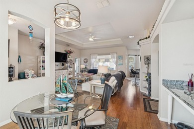 Experience timeless design, modern upgrades, and effortless on Oak Hills Country Club in Florida - for sale on GolfHomes.com, golf home, golf lot