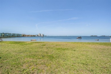 SPECTACULAR SUNSETS, GULF BREEZES, DOLPHINS AND ROSETTA on The Dunedin Country Club in Florida - for sale on GolfHomes.com, golf home, golf lot