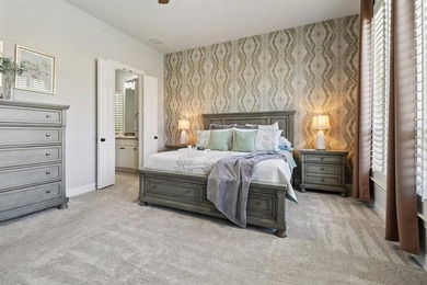 Casual elegance meets resort-style living in this stunning on The Tribute At the Colony in Texas - for sale on GolfHomes.com, golf home, golf lot