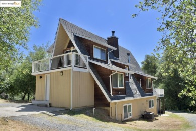 Rare location! Beautiful mid-century modern A-Frame home tucked on Pine Mountain Lake Country Club in California - for sale on GolfHomes.com, golf home, golf lot
