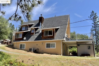 Rare location! Beautiful mid-century modern A-Frame home tucked on Pine Mountain Lake Country Club in California - for sale on GolfHomes.com, golf home, golf lot