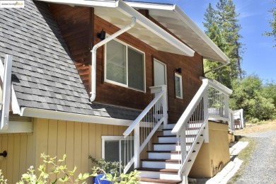 Rare location! Beautiful mid-century modern A-Frame home tucked on Pine Mountain Lake Country Club in California - for sale on GolfHomes.com, golf home, golf lot