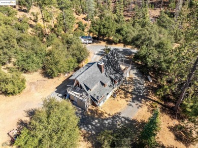 Rare location! Beautiful mid-century modern A-Frame home tucked on Pine Mountain Lake Country Club in California - for sale on GolfHomes.com, golf home, golf lot