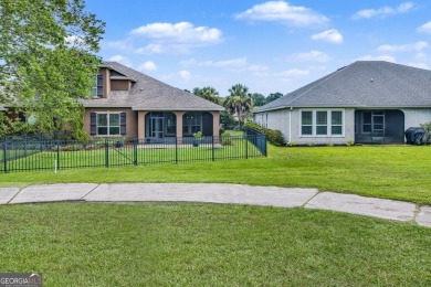 THIS SPACIOUS FOUR-BEDROOM HOME OFFERS OVER 2,700 SQUARE FEET OF on Laurel Island Links in Georgia - for sale on GolfHomes.com, golf home, golf lot