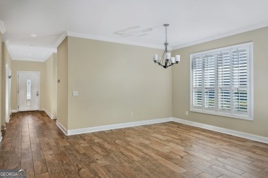 THIS SPACIOUS FOUR-BEDROOM HOME OFFERS OVER 2,700 SQUARE FEET OF on Laurel Island Links in Georgia - for sale on GolfHomes.com, golf home, golf lot