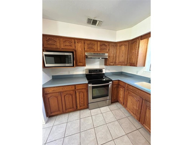 Single level home located on large 13,200 sq ft lot, close to on Harbor Lakes Golf Club in Texas - for sale on GolfHomes.com, golf home, golf lot