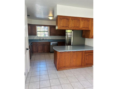 Single level home located on large 13,200 sq ft lot, close to on Harbor Lakes Golf Club in Texas - for sale on GolfHomes.com, golf home, golf lot