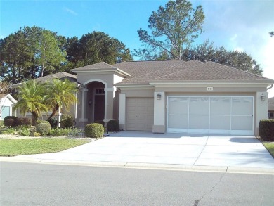 Welcome to this well appointed Del  Webb Hampton Model - 3 on Eagle Ridge At Spruce Creek Country Club in Florida - for sale on GolfHomes.com, golf home, golf lot
