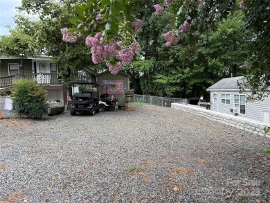 Plenty of space inside and out with this great unit. Double lots on The Tillery Tradition Country Club in North Carolina - for sale on GolfHomes.com, golf home, golf lot