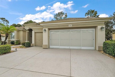 Welcome to this well appointed Del  Webb Hampton Model - 3 on Eagle Ridge At Spruce Creek Country Club in Florida - for sale on GolfHomes.com, golf home, golf lot