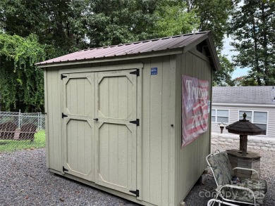 Plenty of space inside and out with this great unit. Double lots on The Tillery Tradition Country Club in North Carolina - for sale on GolfHomes.com, golf home, golf lot