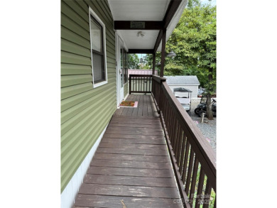 Plenty of space inside and out with this great unit. Double lots on The Tillery Tradition Country Club in North Carolina - for sale on GolfHomes.com, golf home, golf lot