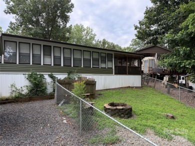 Plenty of space inside and out with this great unit. Double lots on The Tillery Tradition Country Club in North Carolina - for sale on GolfHomes.com, golf home, golf lot