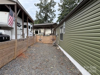 Plenty of space inside and out with this great unit. Double lots on The Tillery Tradition Country Club in North Carolina - for sale on GolfHomes.com, golf home, golf lot