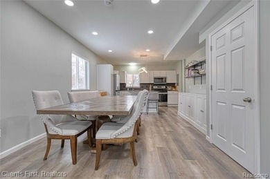 Welcome home to this fully remodeled and beautifully upgraded on Rush Lake Hills Golf Club in Michigan - for sale on GolfHomes.com, golf home, golf lot