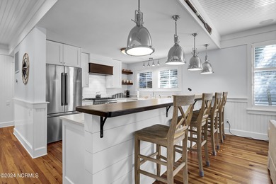 Turnkey coastal living at its finest. Welcome to 15 Surfboat on Bald Head Island Golf Club in North Carolina - for sale on GolfHomes.com, golf home, golf lot