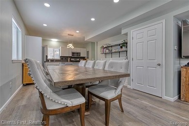 Welcome home to this fully remodeled and beautifully upgraded on Rush Lake Hills Golf Club in Michigan - for sale on GolfHomes.com, golf home, golf lot