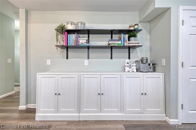 Welcome home to this fully remodeled and beautifully upgraded on Rush Lake Hills Golf Club in Michigan - for sale on GolfHomes.com, golf home, golf lot