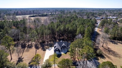 This impeccable home with detailed custom features is a must on Players Course At Wyboo Plantation in South Carolina - for sale on GolfHomes.com, golf home, golf lot