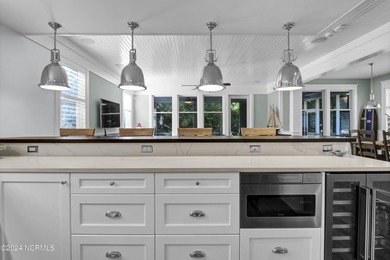 Turnkey coastal living at its finest. Welcome to 15 Surfboat on Bald Head Island Golf Club in North Carolina - for sale on GolfHomes.com, golf home, golf lot