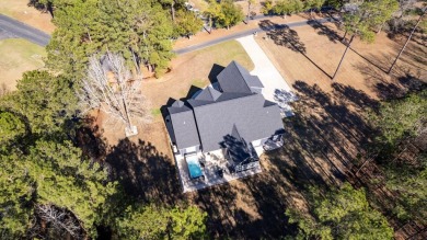 This impeccable home with detailed custom features is a must on Players Course At Wyboo Plantation in South Carolina - for sale on GolfHomes.com, golf home, golf lot