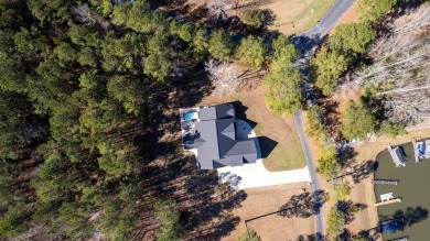 This impeccable home with detailed custom features is a must on Players Course At Wyboo Plantation in South Carolina - for sale on GolfHomes.com, golf home, golf lot