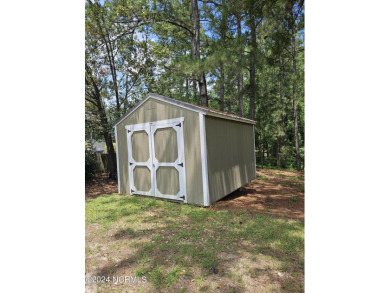 Welcome to 111 Ryder Cup Blvd! This charming 3-bedroom, 2-bath on Bluff Golf Links in North Carolina - for sale on GolfHomes.com, golf home, golf lot