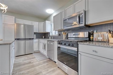 Welcome home to this fully remodeled and beautifully upgraded on Rush Lake Hills Golf Club in Michigan - for sale on GolfHomes.com, golf home, golf lot