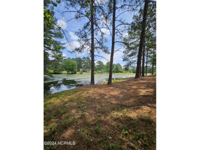 Welcome to 111 Ryder Cup Blvd! This charming 3-bedroom, 2-bath on Bluff Golf Links in North Carolina - for sale on GolfHomes.com, golf home, golf lot