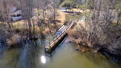 This impeccable home with detailed custom features is a must on Players Course At Wyboo Plantation in South Carolina - for sale on GolfHomes.com, golf home, golf lot