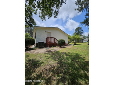 Welcome to 111 Ryder Cup Blvd! This charming 3-bedroom, 2-bath on Bluff Golf Links in North Carolina - for sale on GolfHomes.com, golf home, golf lot