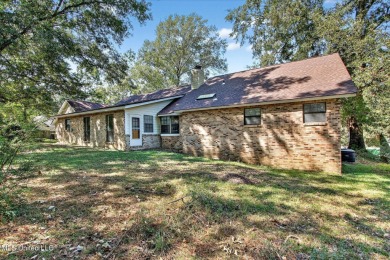 A unique find in a high, dry location in Diamondhead.  This 3 on Diamondhead Country Club in Mississippi - for sale on GolfHomes.com, golf home, golf lot