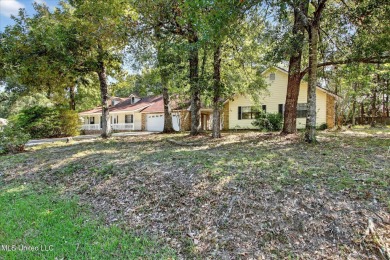 A unique find in a high, dry location in Diamondhead.  This 3 on Diamondhead Country Club in Mississippi - for sale on GolfHomes.com, golf home, golf lot