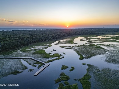 Turnkey coastal living at its finest. Welcome to 15 Surfboat on Bald Head Island Golf Club in North Carolina - for sale on GolfHomes.com, golf home, golf lot
