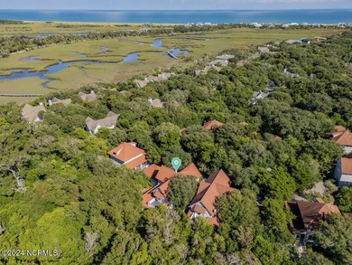 Turnkey coastal living at its finest. Welcome to 15 Surfboat on Bald Head Island Golf Club in North Carolina - for sale on GolfHomes.com, golf home, golf lot