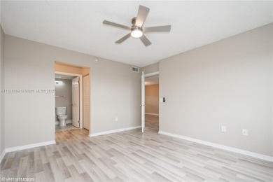 Renovated 2 bedroom 2 bathroom condo offers fresh paint, good on Sunrise Lakes Phase IV Golf Course in Florida - for sale on GolfHomes.com, golf home, golf lot