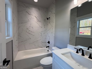 **Stunning New Construction with Owner's Suite on Main & Outdoor on Traditions of Braselton Golf Club in Georgia - for sale on GolfHomes.com, golf home, golf lot