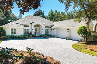 Welcome to 228 Mattie's Way, an extraordinary lakefront retreat on Kelly Plantation Golf Club in Florida - for sale on GolfHomes.com, golf home, golf lot