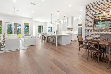 Welcome to 228 Mattie's Way, an extraordinary lakefront retreat on Kelly Plantation Golf Club in Florida - for sale on GolfHomes.com, golf home, golf lot