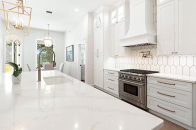 Welcome to 228 Mattie's Way, an extraordinary lakefront retreat on Kelly Plantation Golf Club in Florida - for sale on GolfHomes.com, golf home, golf lot